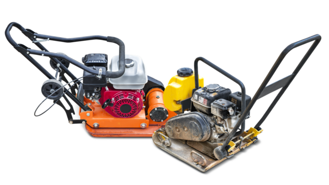a pair of compacting machines designed for soil compaction, positioned next to each other. ready for work in construction or landscaping projects. Isolated