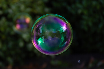 Colourful bubble on a dark background