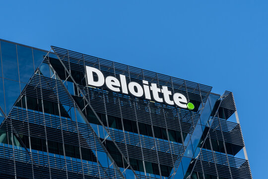 Wellington, New Zealand - February 10, 2024: Close-up of Deloitte logo sign on their office building in Wellington, New Zealand. Deloitte is a professional services network. 