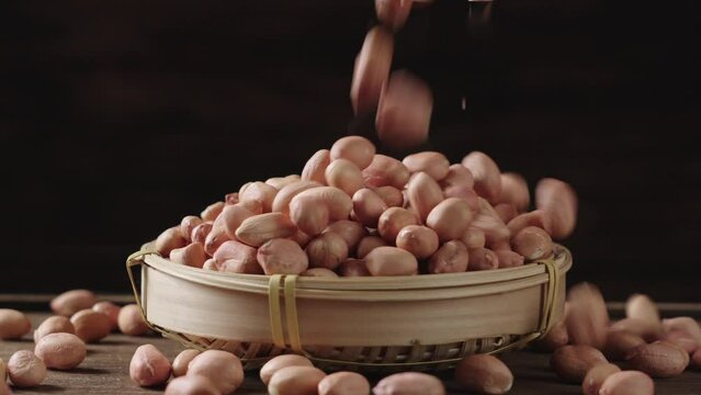 peeled raw peanut kernel on table.