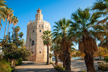 Fototapeta na wymiar the gold tower along the guadalquivir river in seville a fortress built by the arabs to control the entrance from the guadalquivir river