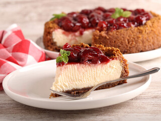 Homemade cherry topping cheesecake slice