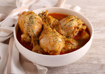 Chicken drumsticks in tomato sauce