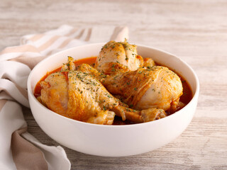 Chicken drumsticks in tomato sauce