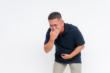 Lively portrait of a middle aged Asian man laughing heartily, capturing the feeling of joy. Trying to contain his laughter while covering his hand.