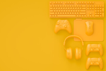 Modern home office setup featuring keyboard, gaming controllers and headphones