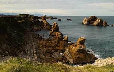 Fototapeta na wymiar Coastal part of Cantabria in the north of Spain, eroded Costa Quebrada, ie the Broken Coast 