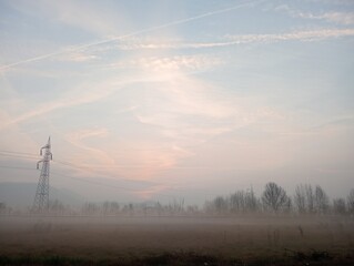 beautiful rural landscape in morning in a foggy day in Winter in Italy 