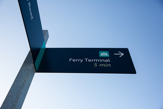 ferry terminal sign with blue sky