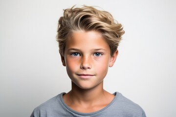 Portrait of a cute little boy with blond hair. Studio shot. - obrazy, fototapety, plakaty