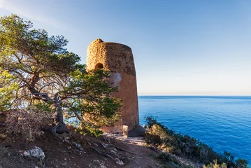 Behangcirkel Torre Caleta, a 16th century watchtower located in front of the Mediterranean in the Acantilados de Maro-Cerro Gordo Natural Park, Nerja, Malaga. © M. Perfectti