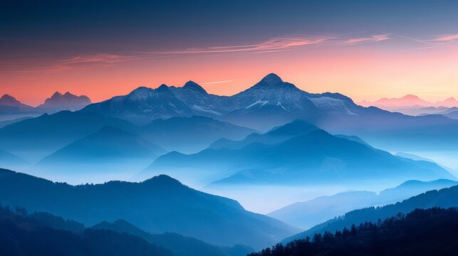 Majestic mountain range with sunrise, clear skies, nature landscape