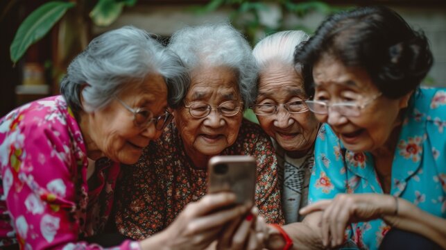 capturing the joyful curiosity of a group of elderly women from various cultural backgrounds, huddled together and smiling as they watch  a smartphone
