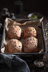 Homemade pumpkin rolls freshly baked in home bakery.