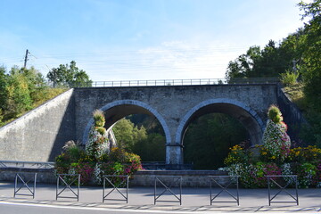 double arches bridge with flowers