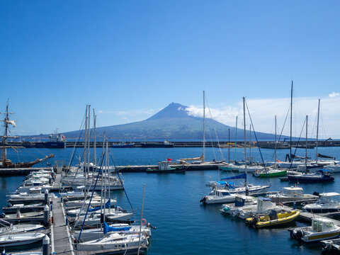Pico Mountain behind the sailboats in Horta marina