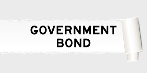 Ripped gray paper background that have word government bond under torn part