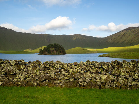 Stone wall by the lake in Caldeir&atilde;o do Corvo