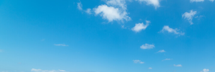 Fototapeta na wymiar Small clouds in the blue sky