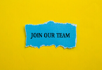 Join our team words written on blue torn paper piece with yellow background. Conceptual business symbol. Copy space.