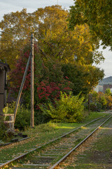 日本　北海道小樽市の廃線された旧国鉄手宮線跡地の線路と紅葉