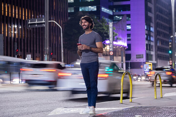 Obraz premium View of a young man with smartphone