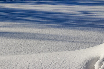 White pure snow shining in the sun, minimal winter background