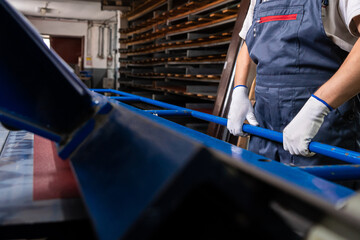 Worker at factory measures works metal production industrial