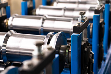 Worker at factory measures works metal production industrial