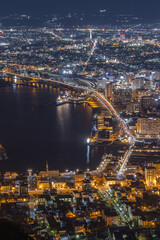 Fototapeta na wymiar 日本　北海道函館市にある函館山展望台から見える市街地の夜景と函館港