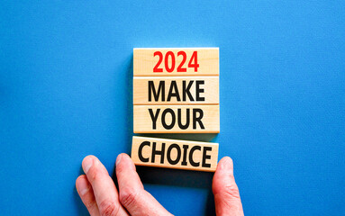 2024 Make your choice symbol. Concept words 2024 Make your choice on beautiful wooden block. Beautiful blue table blue background. Voter hand. Business 2024 Make your choice concept. Copy space.