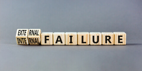 External or internal failure symbol. Concept words External failure or Internal failure on blocks. Beautiful grey table grey background. Business external internal failure concept. Copy space