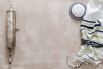 The Scroll of Esther, Tallit, Kippah On a light grunge background. Jewish holiday Purim.