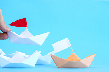 hand puts a boat, ship.ships.