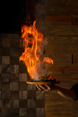 Obraz premium fajitas set on fire on a plate