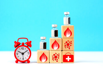  bottles, containers of medicines, vaccines.clock, wooden cubes, medical icons.