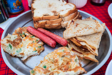 A Hearty Breakfast Spread with Diverse Flavors