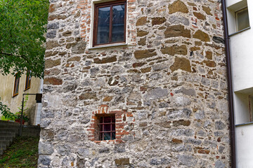 Sightseeing at City of Ljubljana with close-up of stone wall of tower at the old town on a cloudy...