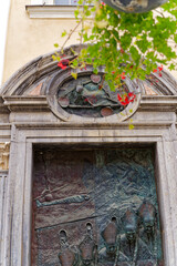 Beautiful bronze door with six bishops of Saint Nicholas Cathedral at the old town of City of Ljubljana on a cloudy summer day. Photo taken August 9th, 2023, Ljubljana, Slovenia.