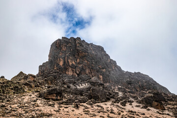 Fototapeta premium Majestic Lava Tower: A Rocky Formation at 4,630m on Mt. Kilimanjaro