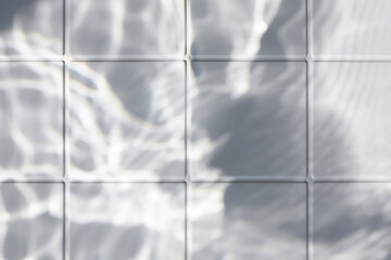 Water wavy texture on the white ceramic tile background