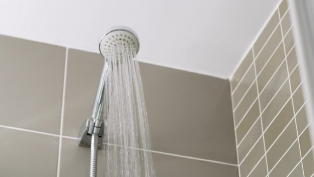 Low angle view of water falling from a shower head