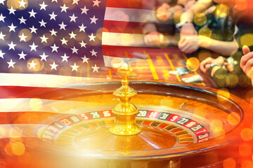 Casino gaming table with USA flag. Playing roulette for money. Casino in las vegas in USA. Roulette...