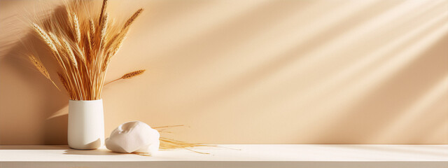 Wheat and Pampas Grass in a White Vase on a White Shelf with a Beige Background