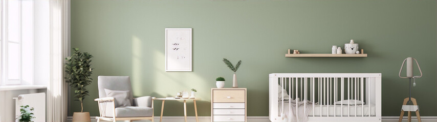 Soft sage green nursery with a white crib, gray chair, and natural wood accents.