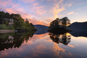 Lake District sunrise at Manesty island on Derwentwater on a still Summer morning. - 738783882