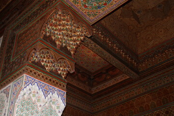 The ceiling of the building is adorned with elaborate and intricate designs, showcasing exquisite...