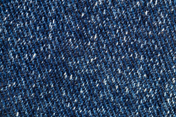 Texture of blue denim close-up. Macro of blue cotton
