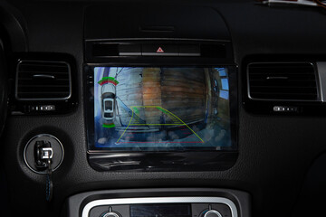 Installation of a modern multimedia system with a rear-view camera on the car. The installation...