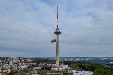 Aerial winter view of huge Lithuanian flag, Independence Day, Vilnius TV Tower, Lithuania